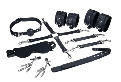 Набір Feral Feelings BDSM Kit 7 Black, наручники, поножі, конектор, маска, падл, кляп, затискачі